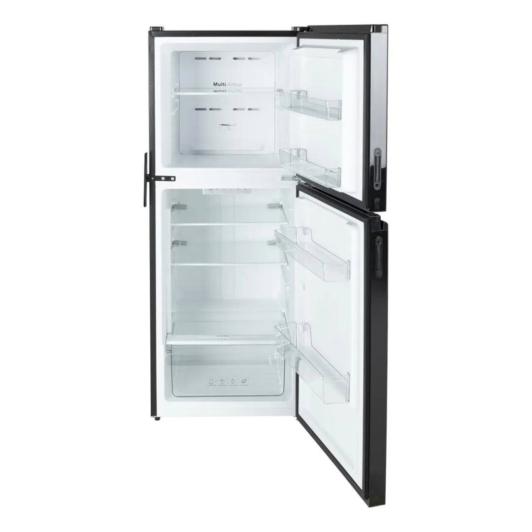 Cleaning the exterior intake vents of an RV refrigerator to improve airflow and cooling.