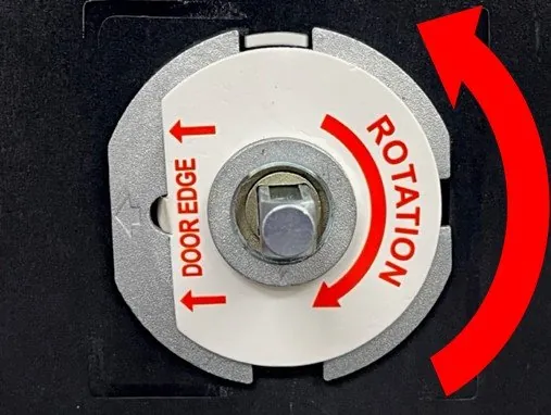 Close up of a deadbolt latch showing mechanical alignment issues within the frame.