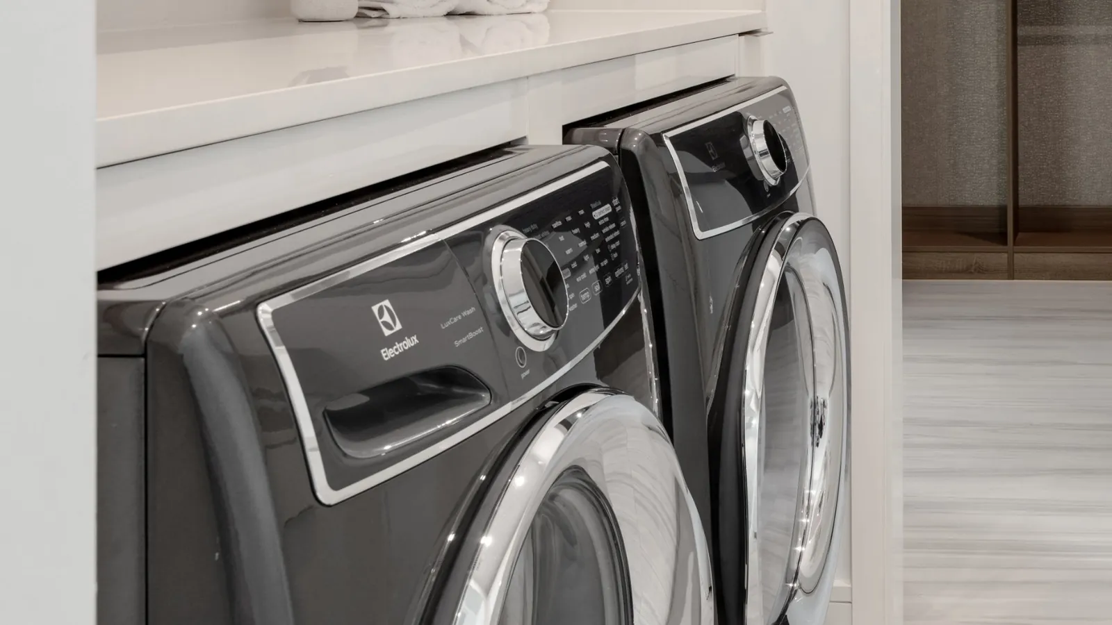 Emptying coins from a pocket before washing to maintain the Electrolux machine.