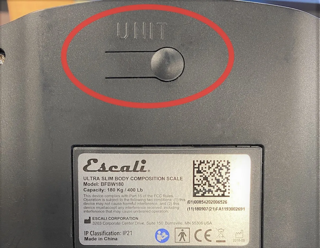An Escali scale display showing an EEEE error code due to overloading.