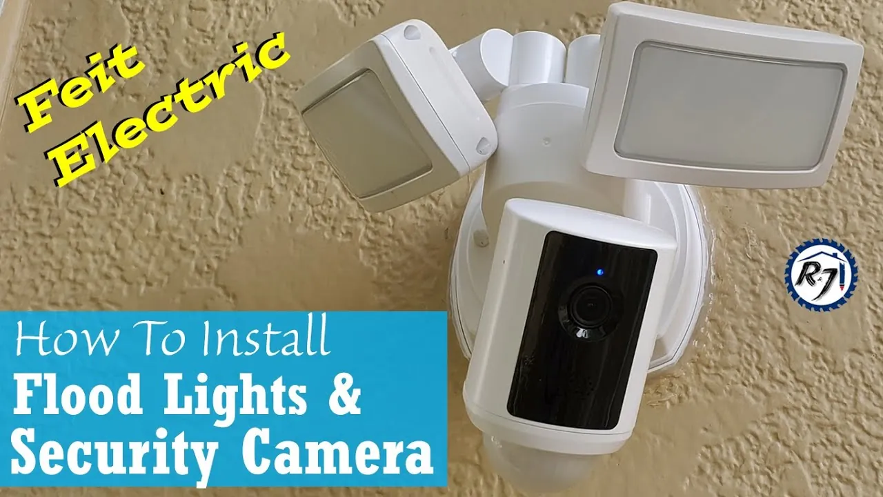 A finger secures the weather-resistant rubber flap on an outdoor security camera unit.