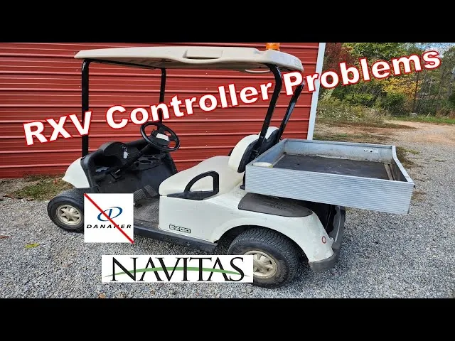Flipping the run-tow switch on an EZGO RXV to reset the system.