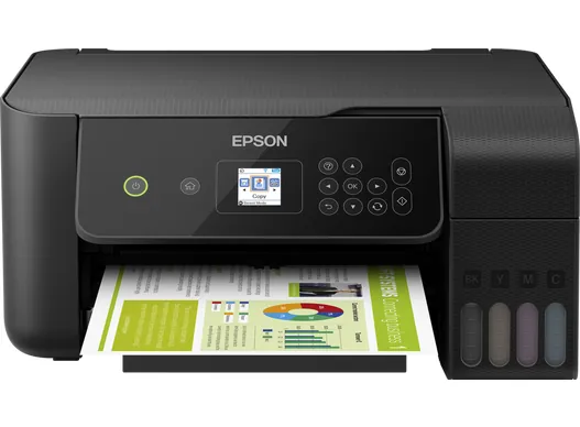 Hands adjusting the paper guides of a printer to prevent feed failures.