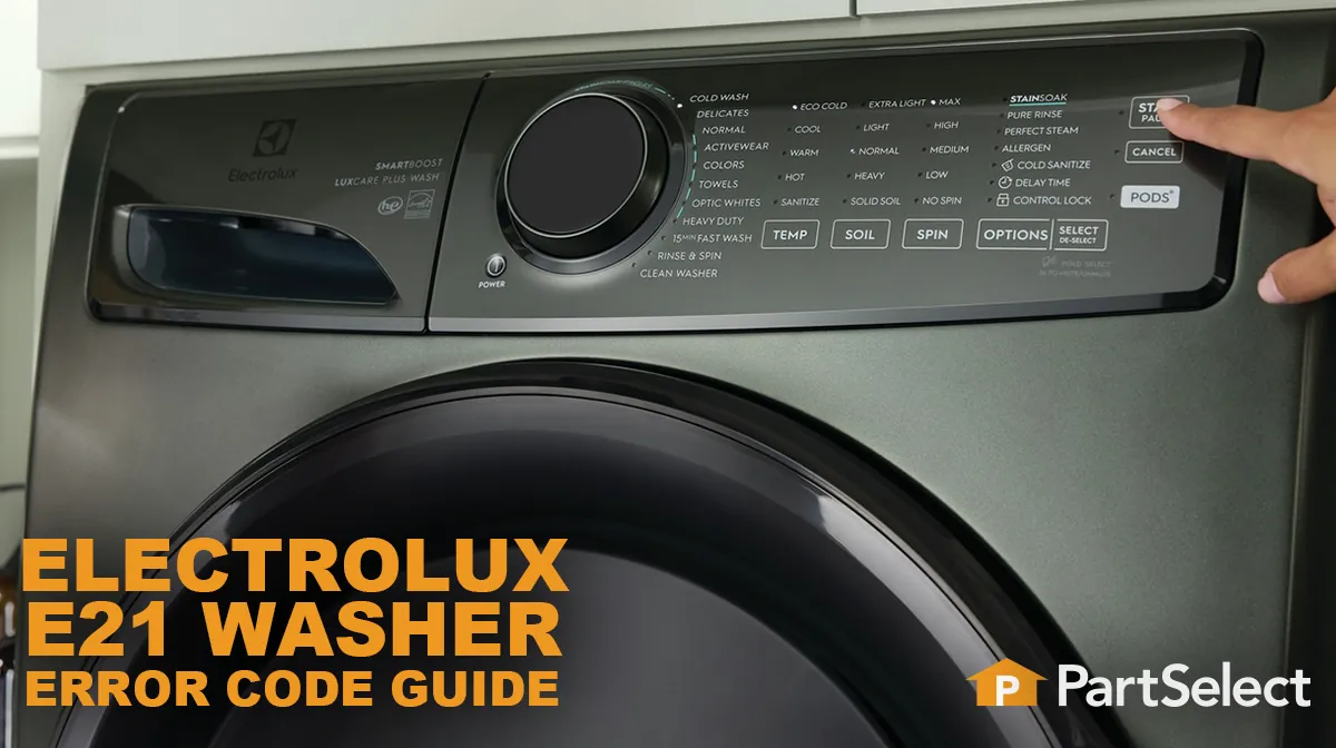 Hands adjusting wet laundry inside a washing machine drum to ensure better balance.