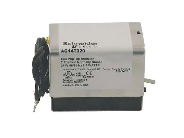 Hands pressing the release tab on an Erie pop top actuator for maintenance.