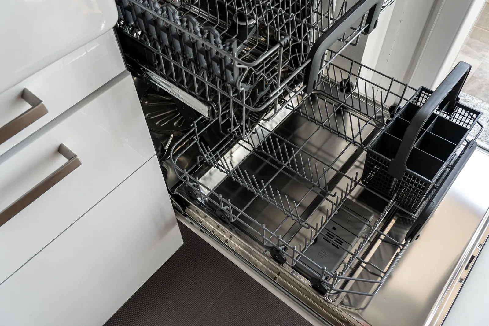 A properly loaded dishwasher rack ensures efficient water circulation and cleaning.