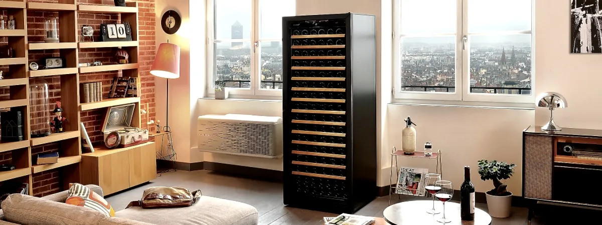 The rear ventilation grill of a wine cabinet shows dust accumulation requiring maintenance.