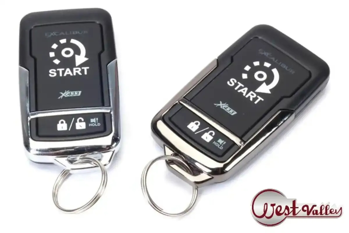 Replacing a small battery inside a car key fob to fix remote start connectivity issues.
