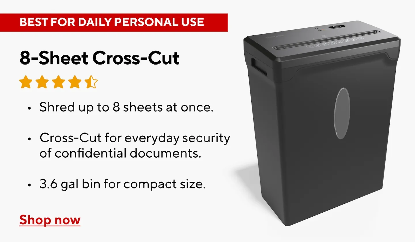The safety interlock switch on an Embassy paper shredder is visible near the bin.