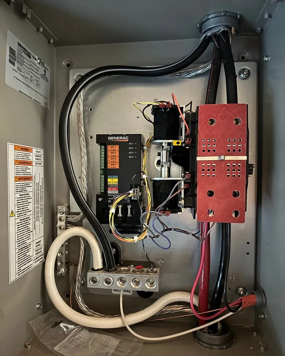 A clean, well-maintained outdoor generator unit with a clear space for proper airflow.