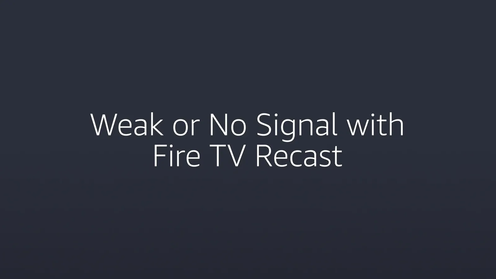 Close-up of a coaxial cable being secured into a Fire TV Recast for troubleshooting.