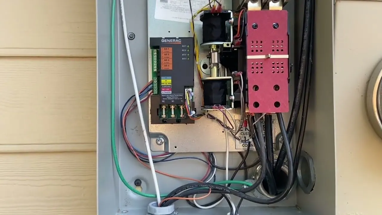 The internal control board of a Generac transfer switch showing detailed wiring and connections.